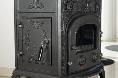 Eros 1 gietijzer detail zijdeur De Kachelerij